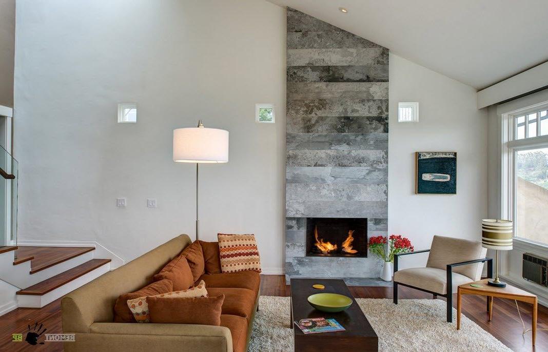 A fireplace decorated with stone slab wall panels