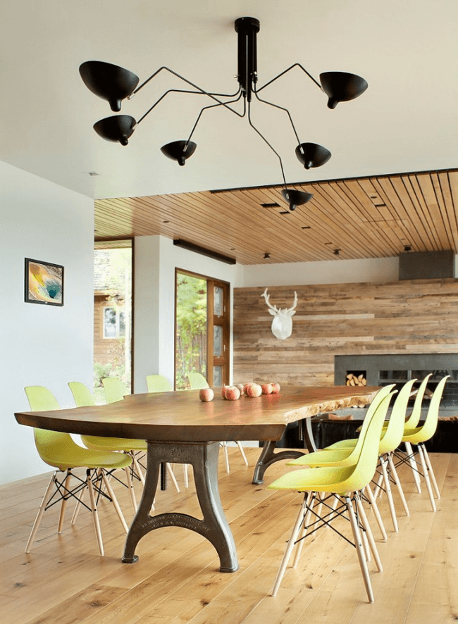 Large wrought-iron dining table with wooden top