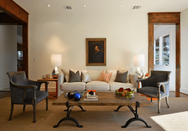 Wooden countertop and wrought iron legs are good choices for a living room