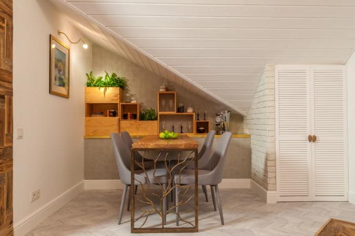 a forged table with a wooden base in the interior of a modern kitchen