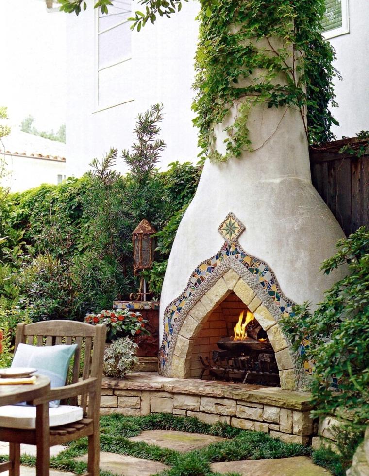 A fireplace in the garden with beautiful decorative mosaic