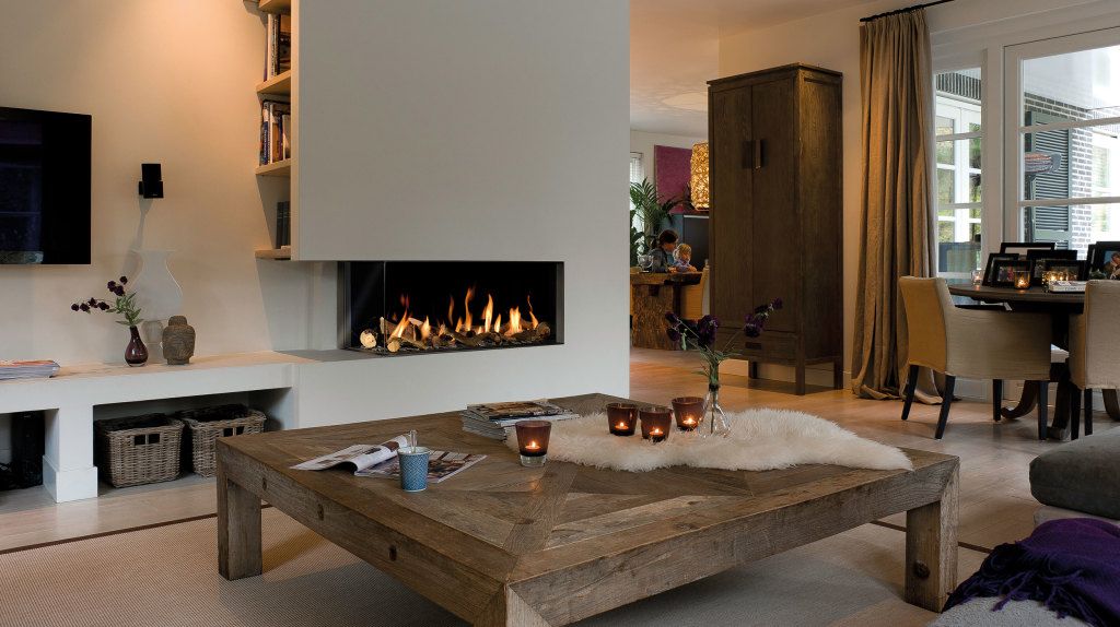 A modern shell for the old idea and functionality. As before, the fireplace is assigned the most worthy place in the house.