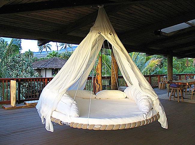 A round canopy bed is a great place to relax and create a fabulous indoor environment