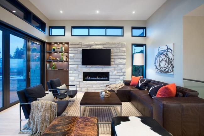 Living room with a stretch ceiling in a modern style