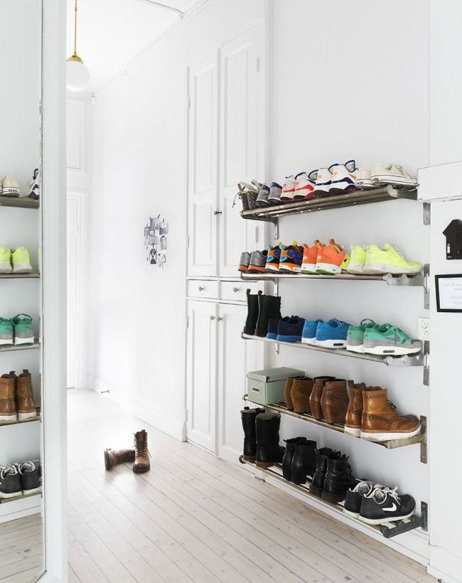 Open shelves for storing shoes in the hallway