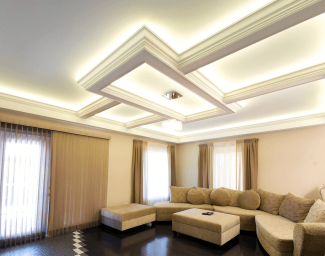 Soaring ceiling in a classic style in the interior of the living room