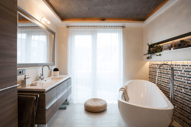 Stretch ceiling in the interior of a modern bathroom