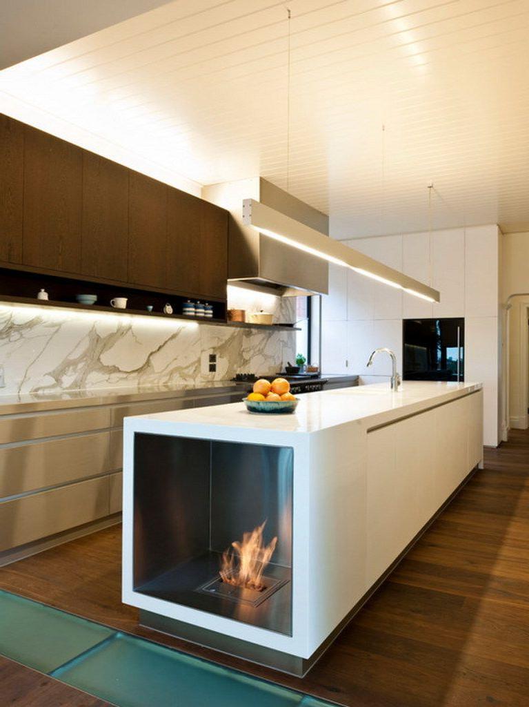 The place for the fireplace is unusual, but the function is the same - beauty and comfort in the house