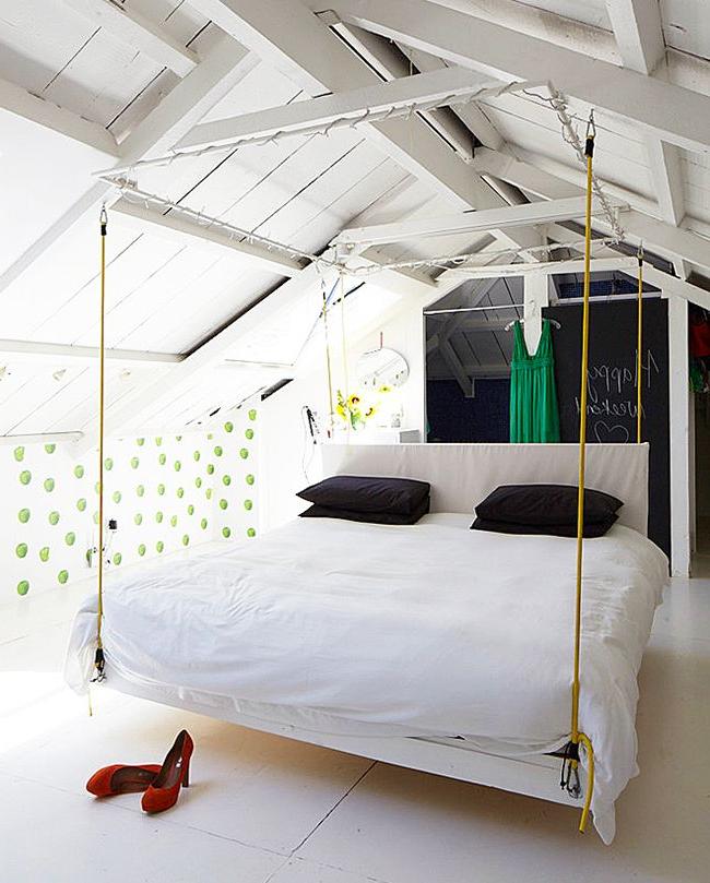 Visually, the hanging bed seems to float above the surface of the room