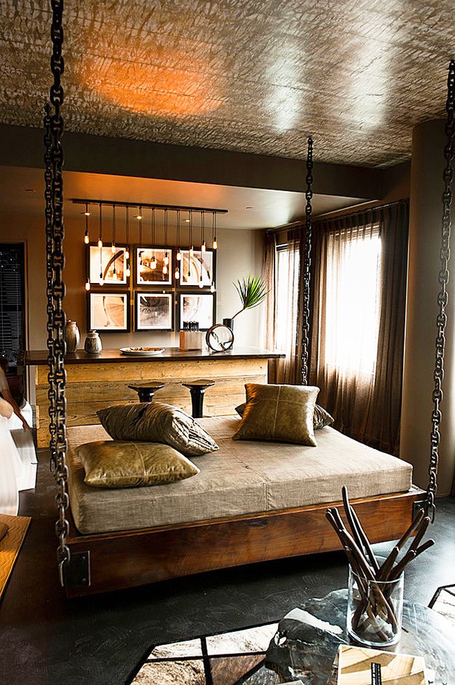 With the help of a wide hanging bed chain, you can emphasize the main idea of ​​the interior