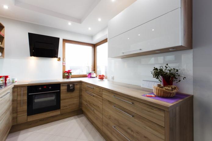 black appliances in the kitchen under a tree