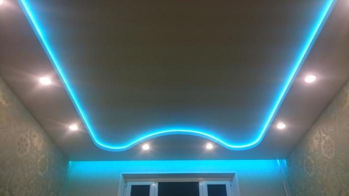 two-level matte floating ceiling with turquoise lighting