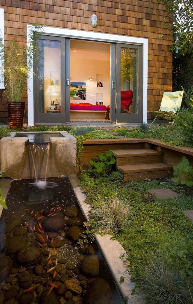 Rectangular pond with a waterfall and a flock of perches